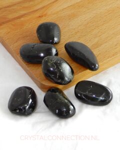 Diopsiet trommelsteen zwart
